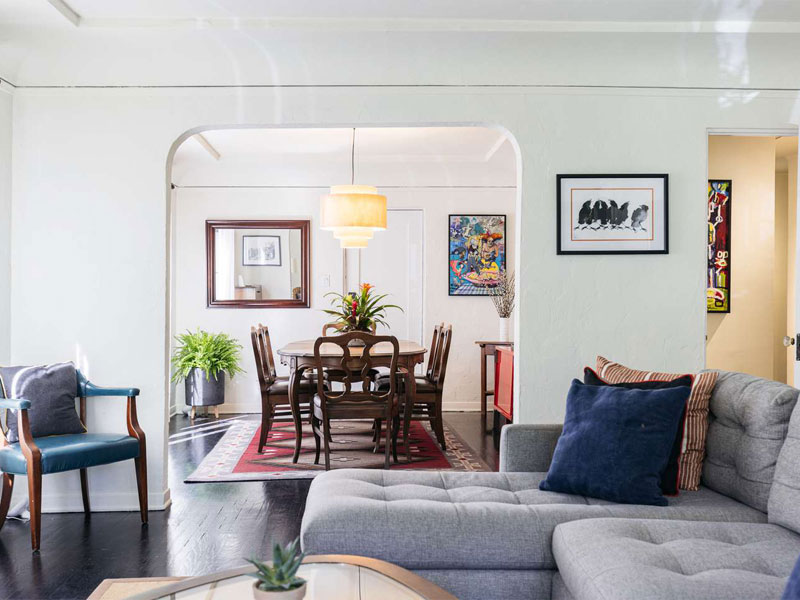 Modern living room design by Homzelite Interiors.